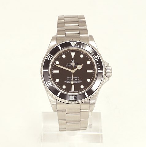 Rolex Submariner Ref. 14060 M. Verkauft von 
Klarlund Kopenhagen August 2009. D: 40mm. Wird mit 
Box und Zertifikat geliefert