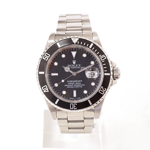 Rolex Submariner, Ref. 16610. Leveres med box og 
certifikat. Solgt hos AD 05.01.91. D: 40mm. 
Trykprøvet juli 2018