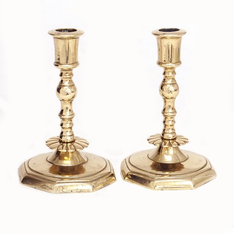 A pair of mid 18th century brass candle sticks. 
Denmark circa 1750. H: 15cm