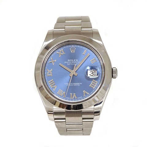 Rolex Oyster Perpetual Datejust Ref. 116300 med 
blå skive. Solgt 14.03.2014. Leveres med box og 
certifikat. Pæn stand dog med brugsspor. D: 42mm