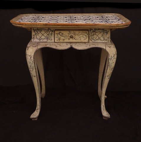 An 18th century tile top table. Denmark circa 
1760. H: 77cm. Top: 60x86cm