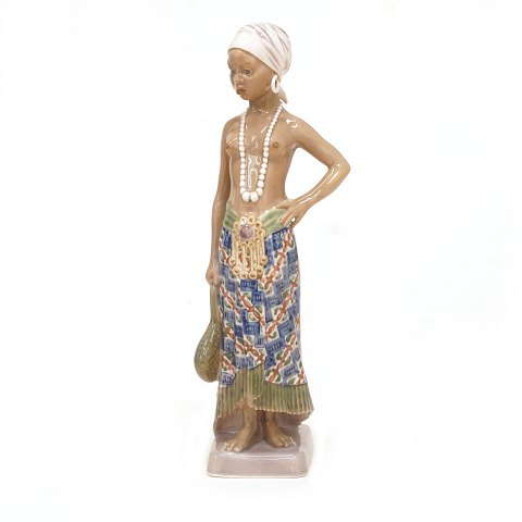 Dahl Jensen figur 1117. "Pige fra Øst Sierra 
Leone". H: 24,5cm