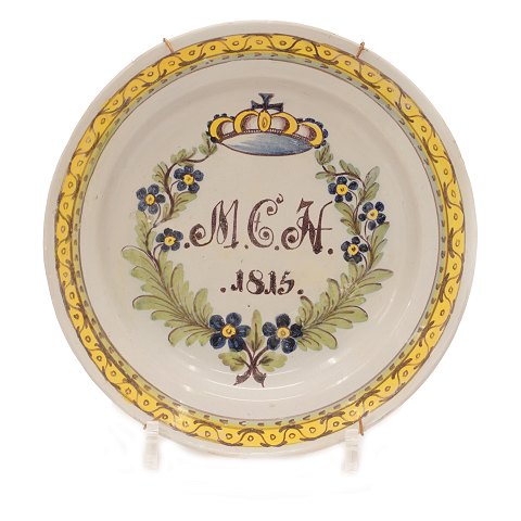 Signed Northgerman Kellinghusen faience plate 
dated 1813. D: 22cm