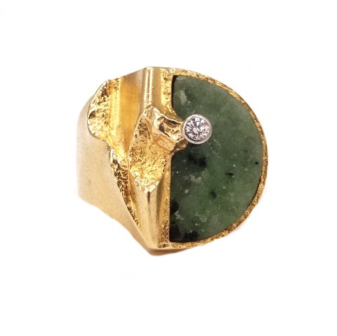 18kt gold Lapponia ring by Björn Weckström with a 
zoisit and diamond of circa 0,5ct. Ringsize 55