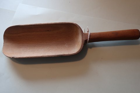 An old spoon made of wood  from the old grocer