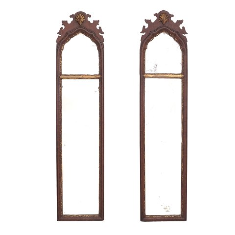 Pair of Baroque partly gilt mahogany mirrors. 
Northgermany circa 1750. Size: 90x21cm