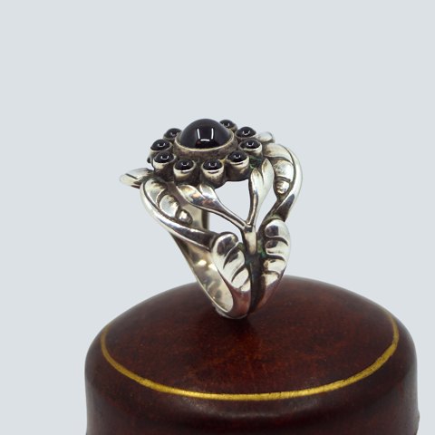 Georg Jensen; Moonlight Blossom ring of sterling silver with black agates, no. 10