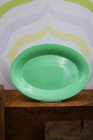 Ursula fad i fajance fra Royal Copenhagen designet af Ursula Munch-Petersen i lys grøn glasur...
