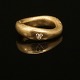 Lynggaard Love ring nr. 5. Charlotte Lynggaard Love ring i 14kt guld med 
diamant. Ringstr. 56. V: 9,8gr