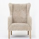 Roxy Klassik 
presents: 
Ejner 
Larsen
'Slotsholm' 
easy chair with 
matching foot 
stool in new 
lambskin.
Contact ...