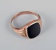 Henry Roland, 
dansk guldsmed. 

14 karat 
guldring med 
onyx.