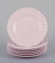 Tuscan, England. Seven plates in light pink porcelain with a wavy edge.Fine English bone China.