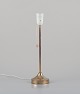 Nybro 
Armaturfabrik, 
Sweden. Brass 
table lamp.
Sleek ...