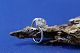 Gold ring for women in 14 carat gold, with clear stones. 
Size 56.