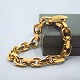 Frantz 
Hingelberg; A 
wide bracelet 
of 14k gold, w. 
10 mm