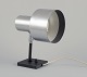 L'Art 
præsenterer: 
Fogh og 
Mørup, dansk 
lampedesigner.
Væglampe i 
aluminium og 
metal.