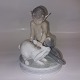 Reutemann Antik 
presents: 
Royal 
Copenhagen: Pan 
with rabbit 
figure In 
porcelain
