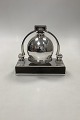 Danam Antik 
præsenterer: 
Georg 
Jensen Stor Art 
Deco Bordklokke 
på base Jørgen 
Jensen 
1933-1944