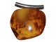 Large amber pendant with silver mounting