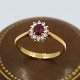 Antik Damgaard-Lauritsen presents: Ring in 18k gold set with a ruby and diamonds
