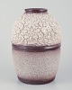 French 
ceramicist.
Ceramic vase. 
Lava glaze in 
light ...