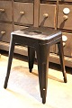 Original old French Tolix stool in black painted metal with a fine patina...