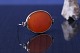 Gold brooch with orange stone, in 14 carat gold. Very elegant.