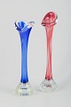 L'Art presents: 
Swedish 
glass artist
Two vases in 
colored and 
clear glass.