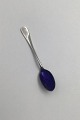 Danam Antik 
presents: 
A 
Michelsen 
Sterling Silver 
Ida Salt Spoon 
(Blue enamel)
