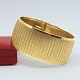 Meget bredt armbånd  i 18 kt. guld