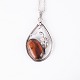 Osted Antik & Design presents: Pendant with silver necklace in silver and amber, unique design