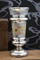 K&Co. presents: 
Vase in 
19th century 
Mercury Glass 
with finely 
decorated 
floral motif. 
H: 22cm...