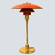 Poul Henningsen; PH 3/2 table lamp, with red lacquered shade
