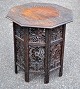 Pegasus – Kunst 
- Antik - 
Design 
presents: 
Arabic 
octagonal 
smoking table 
with numerous 
carvings, 19th 
century.