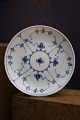 Round cake plate in Fluted Blue Plain from Royal Copenhagen. 
1/11...
