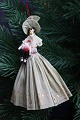 K&Co. presents: 
Old 
Christmas tree 
ornament, nice 
lady holding a 
small Santa 
Claus doll, 
made of colored 
crepe ...