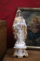 Decorative, old Madonna figurine in porcelain of the Virgin Mary with the baby Jesus...