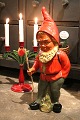 K&Co. presents: Large terracotta gnome from the 50s with fine painting, backpack and wooden cane. Height: 49.5cm.