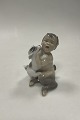 Danam Antik presents: Royal Copenhagen Figurine og Faun with Dog No 2823