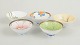 L'Art presents: Set of 5 small Chinese porcelain bowls, hand decorated.