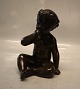 Klosterkælderen presents: Just A Disko D 2323 Boy sitting sucking thump 19.5 cm Bronzed sculpture