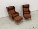 MR Retro Design presents: Mogens Hansen MH195 wingback chairs with matching footstoolsCognac-colored ...