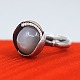 Antik Damgaard-Lauritsen presents: Ole Lynggaard; Lotus ring no. 3. in silver, set with moonstone and diamonds