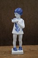 K&Co. presents: Royal Copenhagen Blue Flower porcelain figurine of a little girl with a butterfly on her arm...