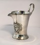 Lundin Antique presents: Gebr. Godet & Co, Berlin. Silver jug ​​with Medusa portrait (800). Height ...