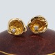Antik Damgaard-Lauritsen presents: C. Antonsen; Pair of earrings in 14k gold, set with diamonds