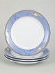 L'Art presents: Royal Copenhagen Blue Magnolia, set of four plates.