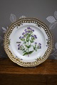 K&Co. presents: Small dinner plate in Flora Danica set produced by Royal Copenhagen in Denmark...