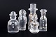 L'Art presents: Kosta Boda, set of five “Family” glass figures.
