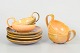 L'Art presents: Kähler, set of four teacups with matching saucers.